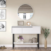 Console d’entrée blanche CYRIUS avec miroir rond assorti, design moderne et épuré.